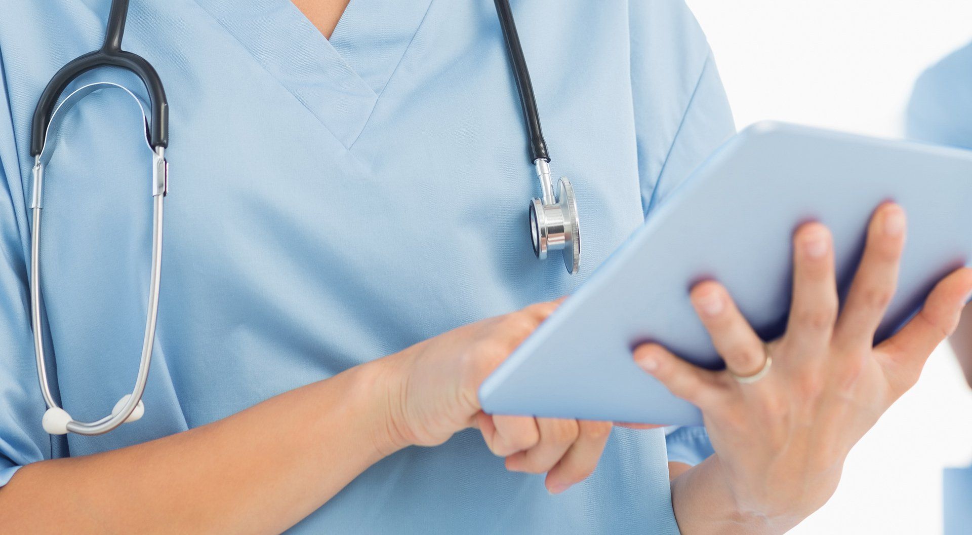 A clinician preparing clinic notes